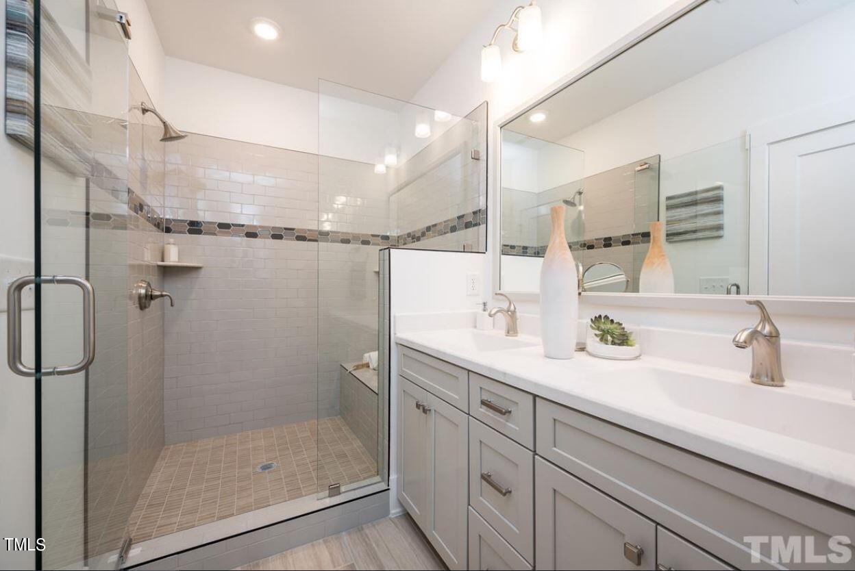 11548 Helmond Way, Unit 109 Raleigh, NC 27617 - Photo 2 of 27 Oberlin bath staged