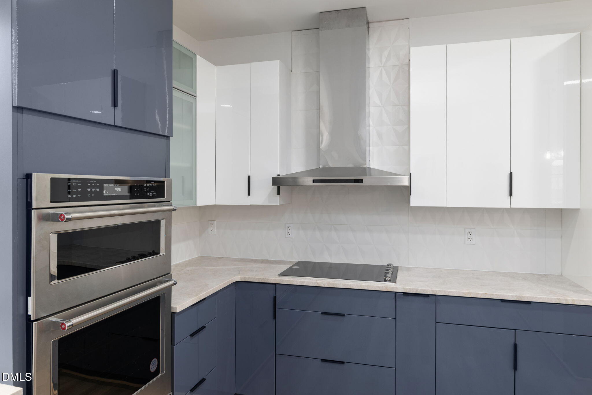 309 Bragg Street Raleigh, NC 27601 - Photo 17 of 55 a kitchen with granite countertop cabinets stainless steel appliances and sink