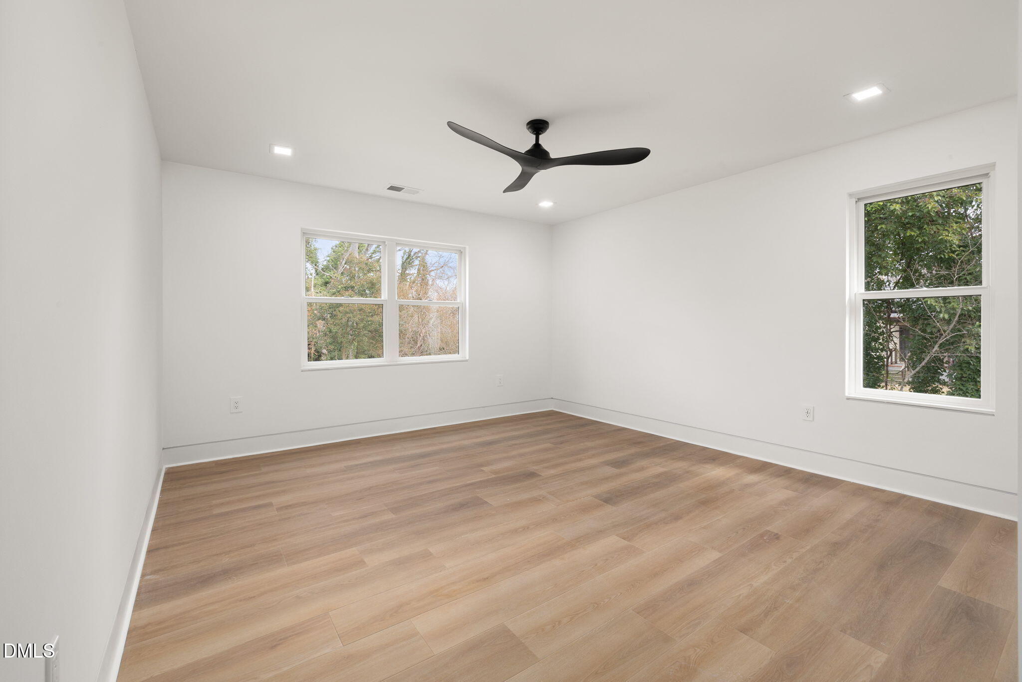 309 Bragg Street Raleigh, NC 27601 - Photo 38 of 55 an empty room with windows and closet