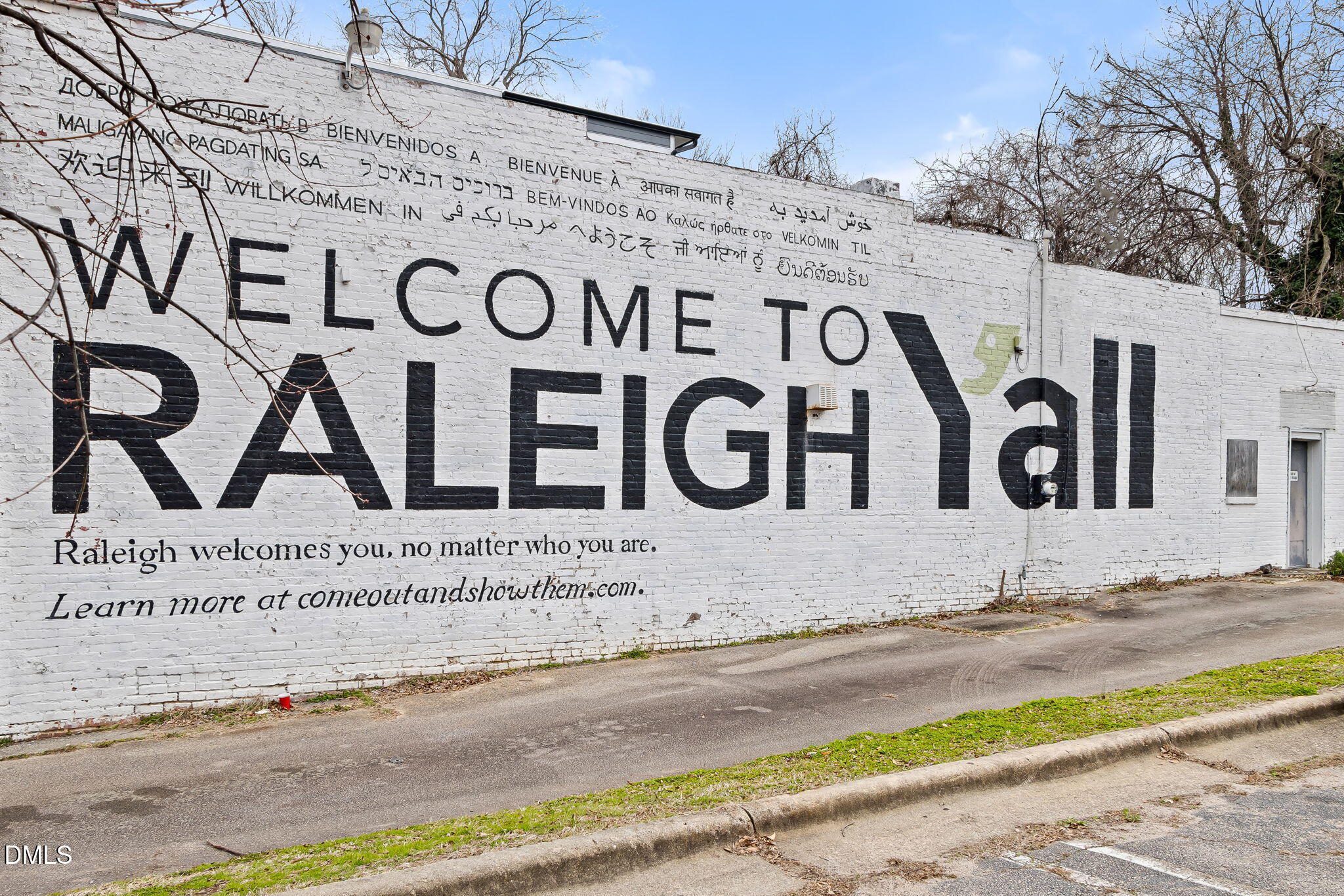 309 Bragg Street Raleigh, NC 27601 - Photo 50 of 55 a sign broad on the side of a building