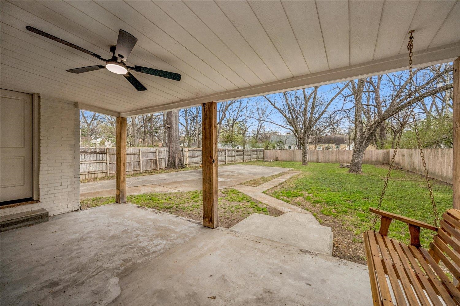 708 Loeb Street Memphis, TN 38111 - Photo 16 of 19 a view of an house with backyard and tree