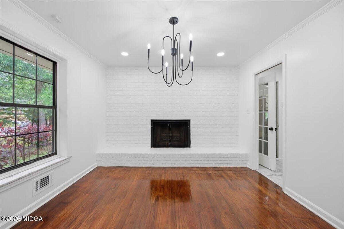 4506 Rivoli Drive Macon, GA 31210 - Photo 11 of 35 a view of wooden floor chandelier and window in a room