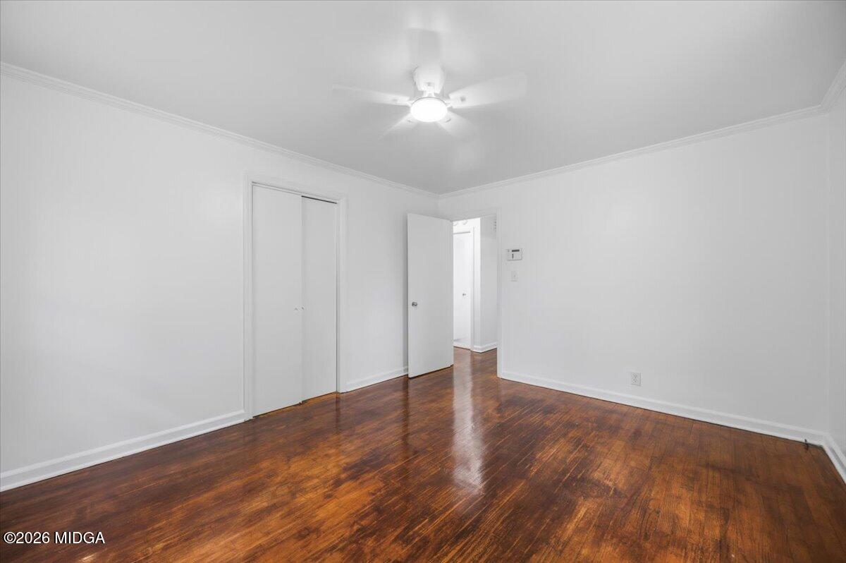 4506 Rivoli Drive Macon, GA 31210 - Photo 18 of 35 a view of an empty room with wooden floor