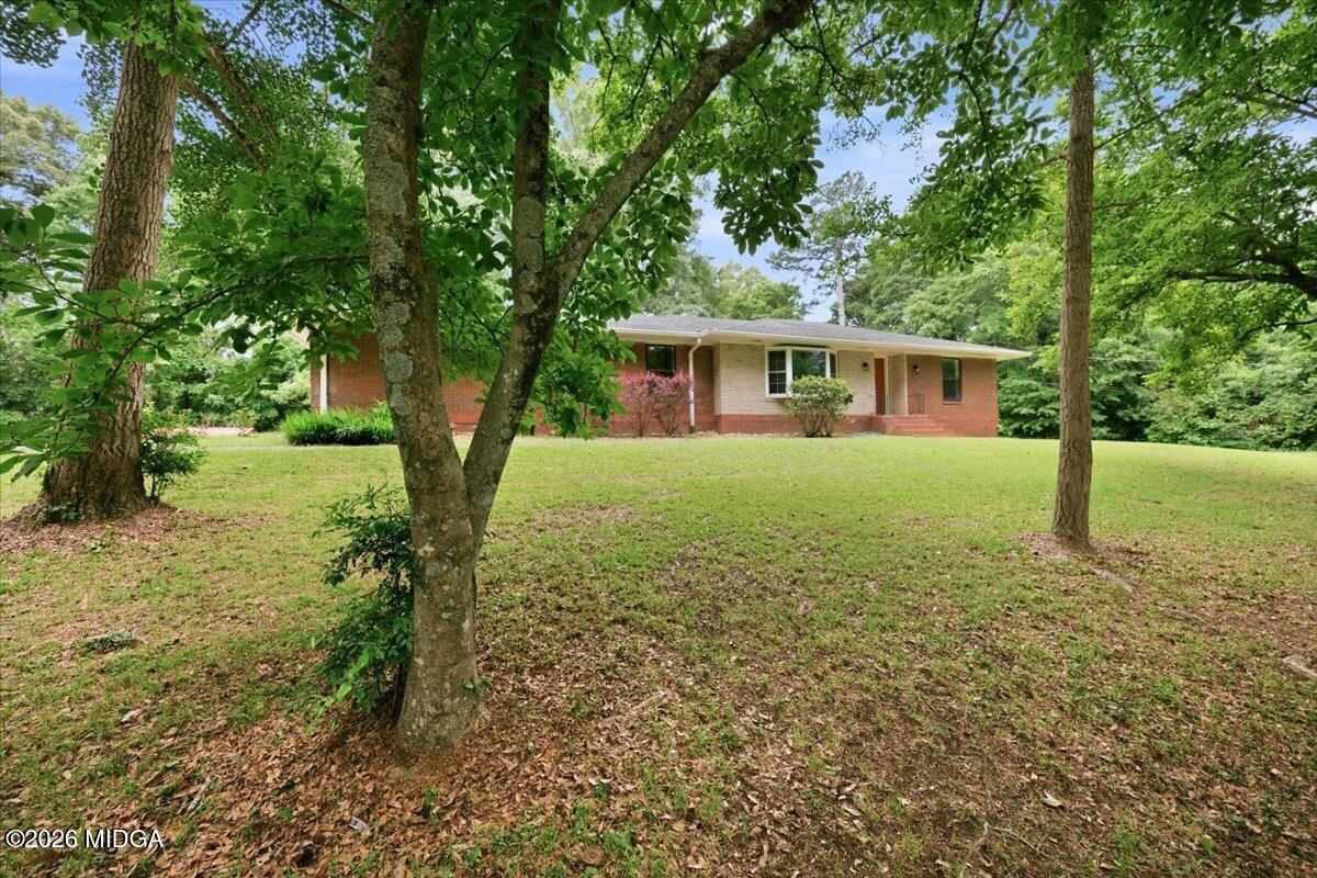 4506 Rivoli Drive Macon, GA 31210 - Photo 2 of 35 a view of a house with a yard