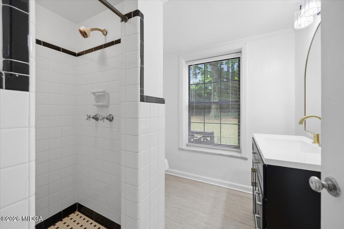 4506 Rivoli Drive Macon, GA 31210 - Photo 24 of 35 a bathroom with a sink and a mirror