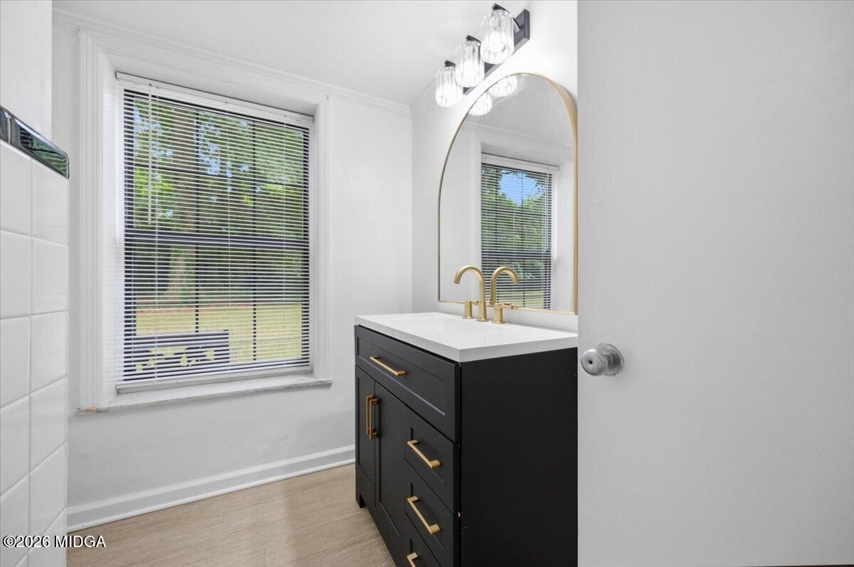 4506 Rivoli Drive Macon, GA 31210 - Photo 25 of 35 a bathroom with a sink and a mirror