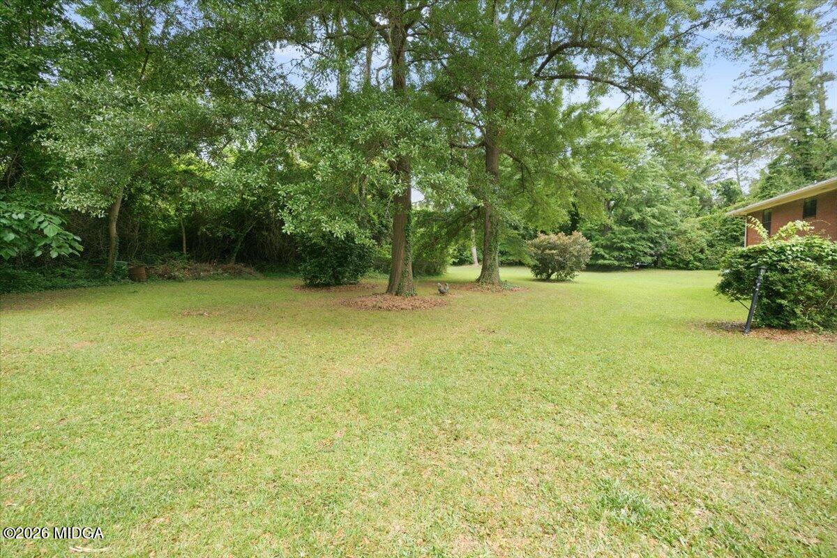 4506 Rivoli Drive Macon, GA 31210 - Photo 31 of 35 a view of outdoor space with deck and garden