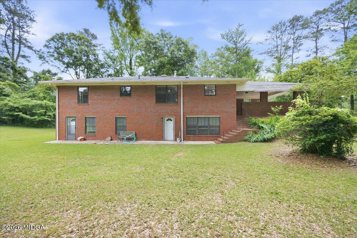 4506 Rivoli Drive Macon, GA 31210 - Photo 32 of 35 front view of a house with a yard