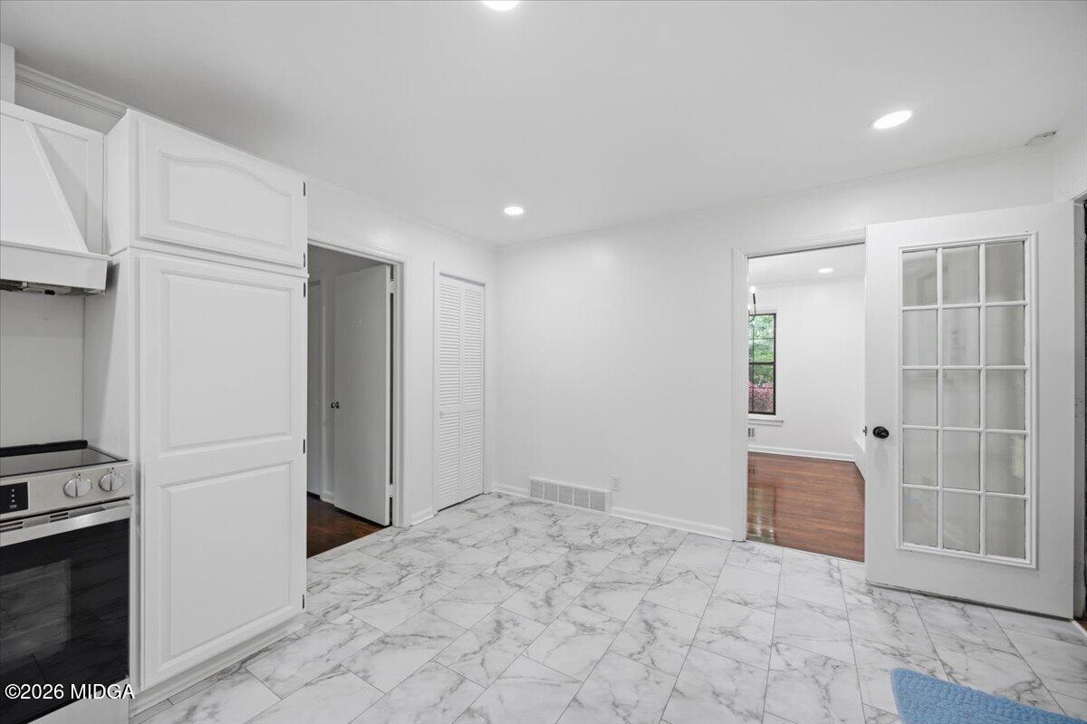 4506 Rivoli Drive Macon, GA 31210 - Photo 7 of 35 a view of empty room with entryway and stairs