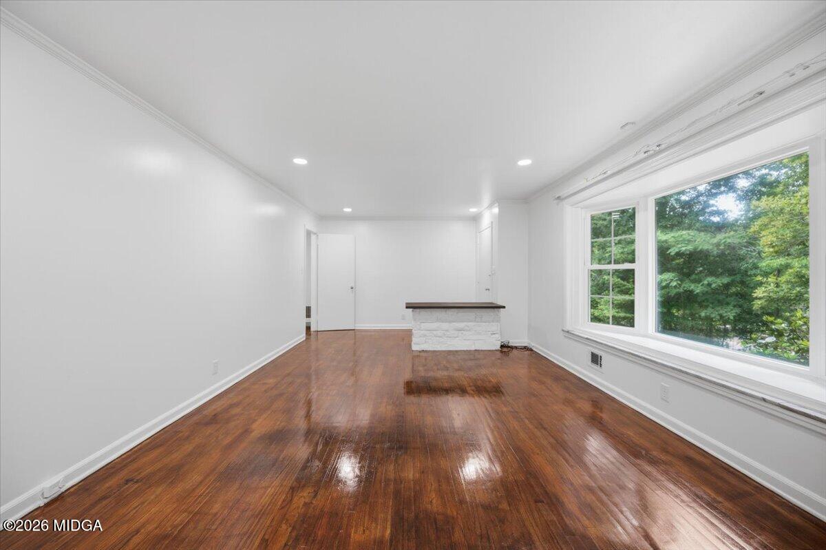 4506 Rivoli Drive Macon, GA 31210 - Photo 10 of 35 a view of a room with wooden floor and natural light