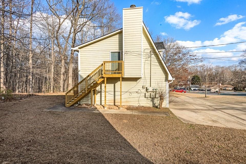 2037 Laboon Circle Atlanta, GA 30349 - Photo 17 of 18 a view of a house with a park
