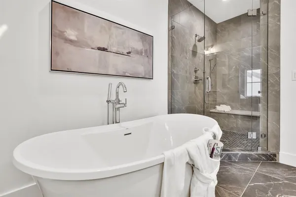 a bathroom with double vanity sink and a mirror