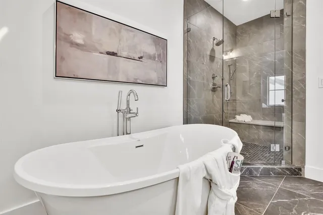 a bathroom with double vanity sink and a mirror