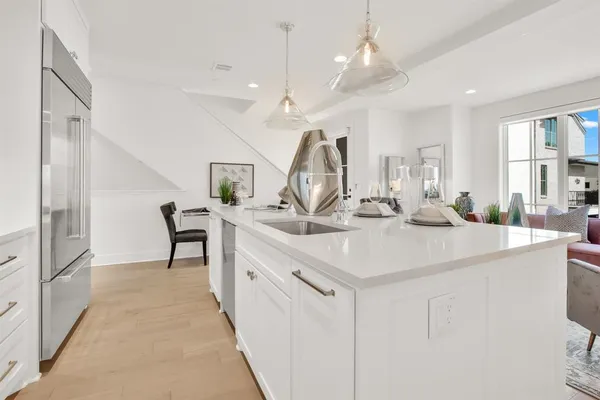 a view of kitchen and sink