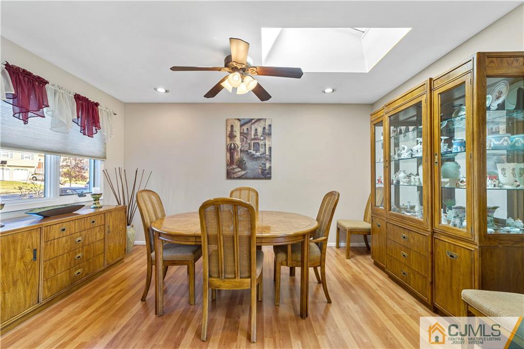 6 Albemarle Road East Brunswick, NJ 08816 - Photo 12 of 30 a view of a dining room with furniture window and wooden floor