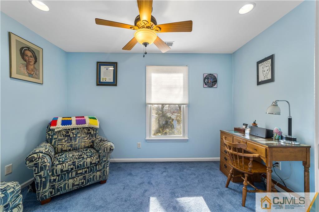 6 Albemarle Road East Brunswick, NJ 08816 - Photo 22 of 30 a room with furniture and a window