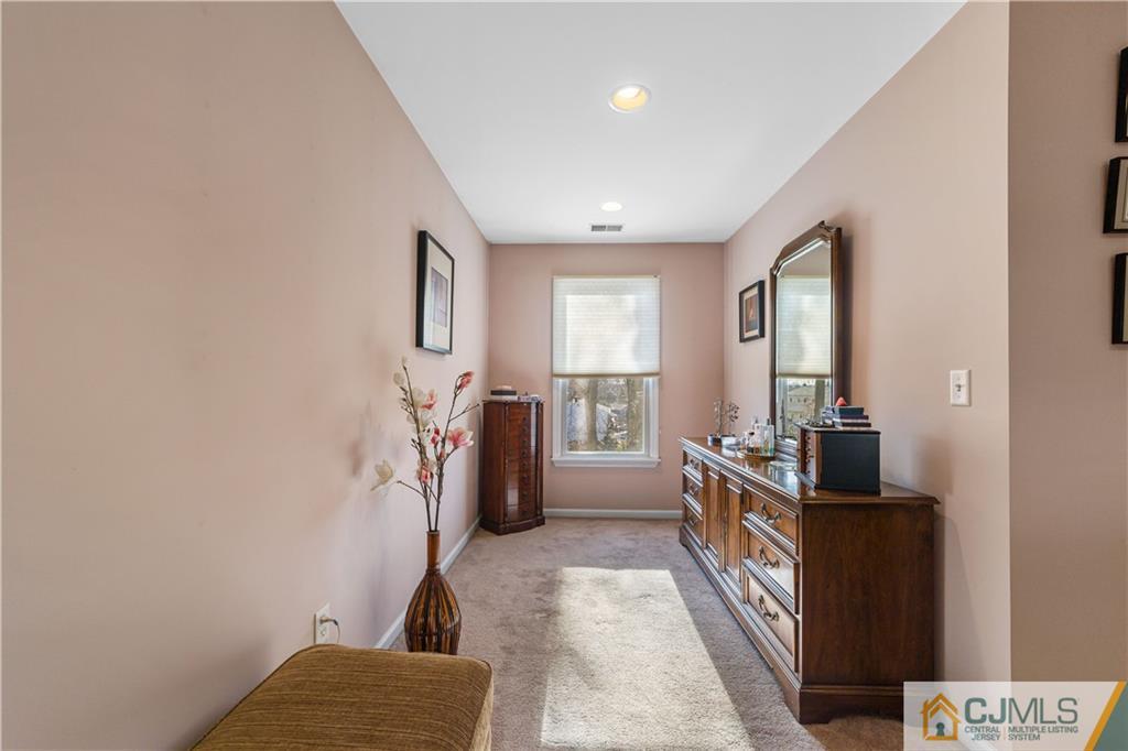 6 Albemarle Road East Brunswick, NJ 08816 - Photo 25 of 30 a view of a hallway with a living room