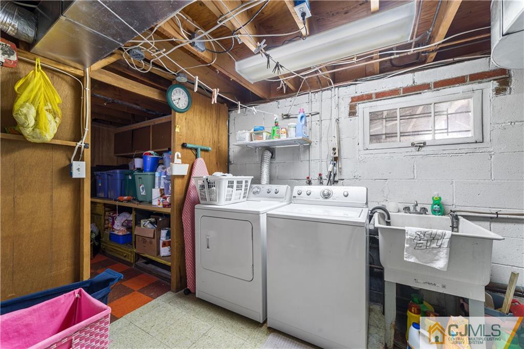 6 Albemarle Road East Brunswick, NJ 08816 - Photo 27 of 30 a utility room with dryer and washer