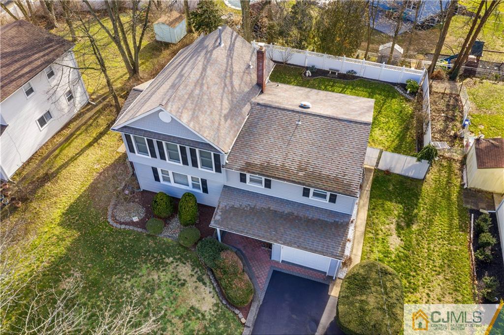 6 Albemarle Road East Brunswick, NJ 08816 - Photo 28 of 30 front view of a house with a yard