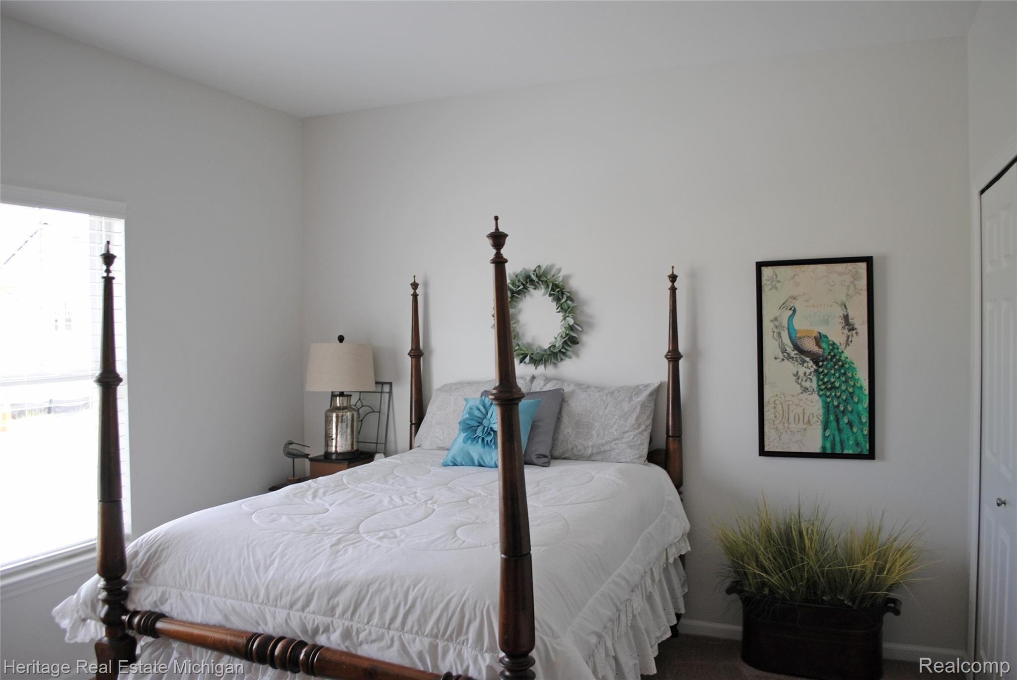 412 Brigg Street Howell, MI 48855 - Photo 10 of 20 Another view of this superb bedroom with the sun shining in to light the room!
