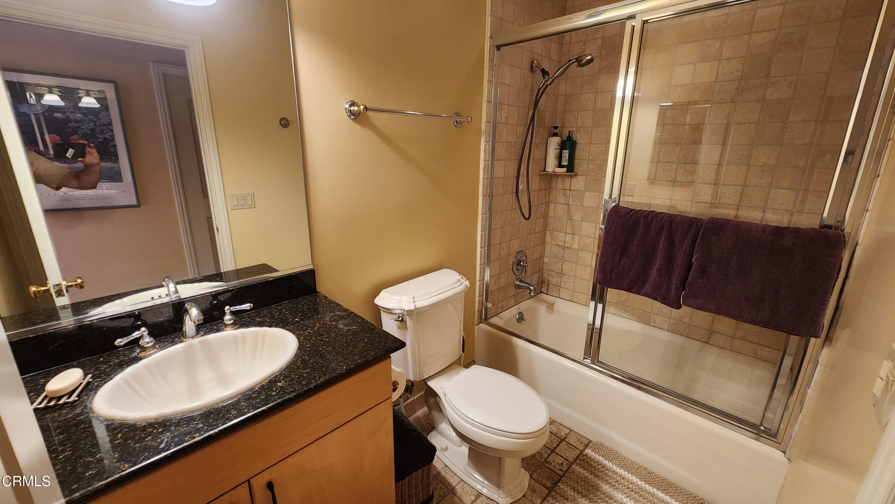 1772 Corson Street Pasadena, CA 91106 - Photo 17 of 25 a bathroom with a sink toilet and shower