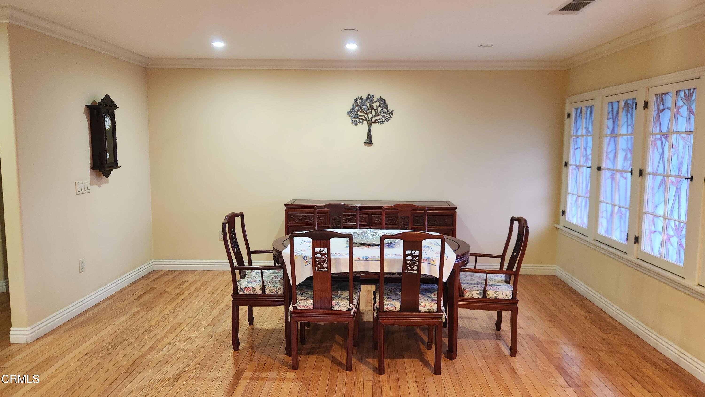 1772 Corson Street Pasadena, CA 91106 - Photo 4 of 25 a view of a dining room with furniture and wooden floor