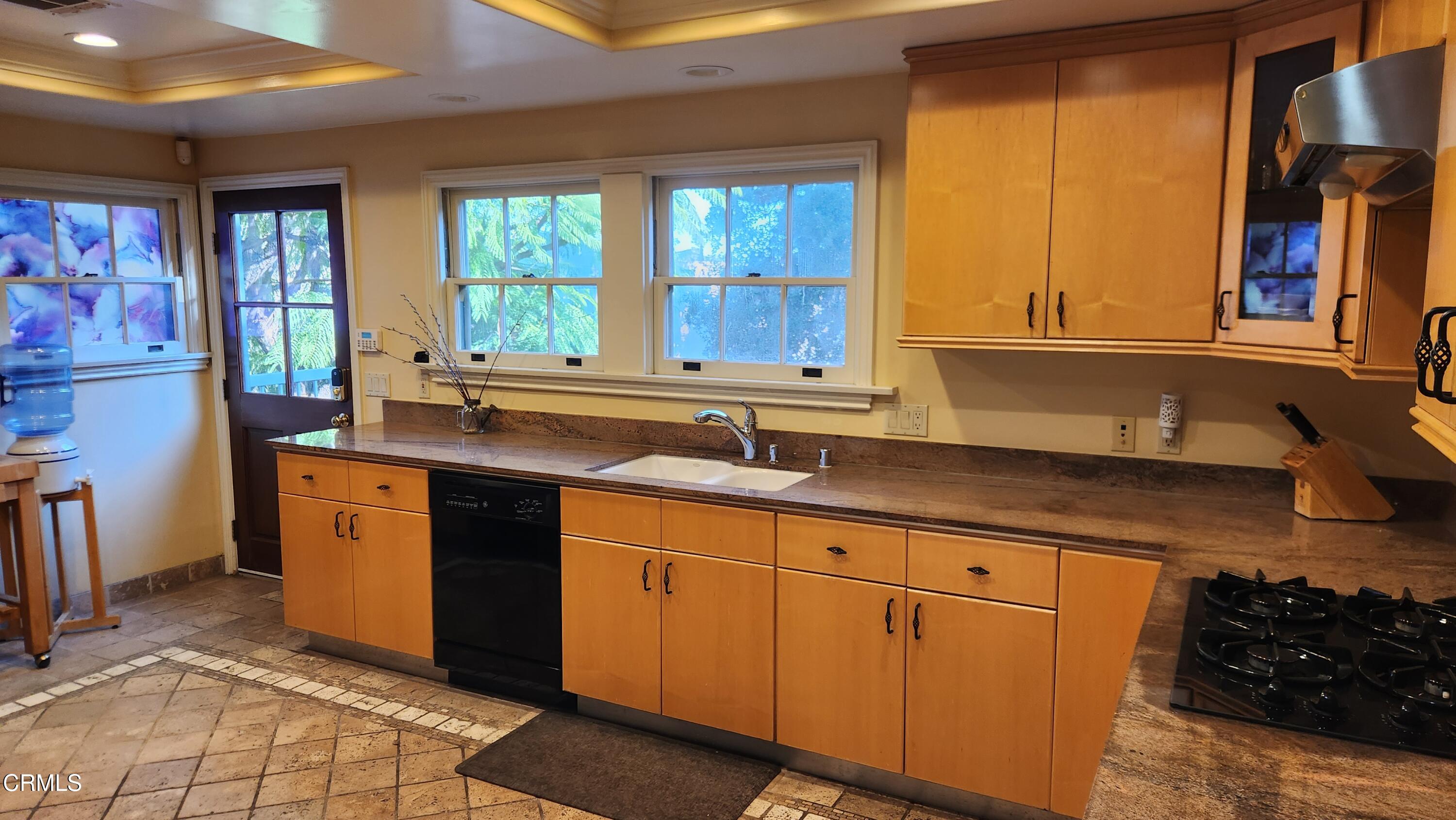 1772 Corson Street Pasadena, CA 91106 - Photo 5 of 25 a kitchen with sink cabinets and window