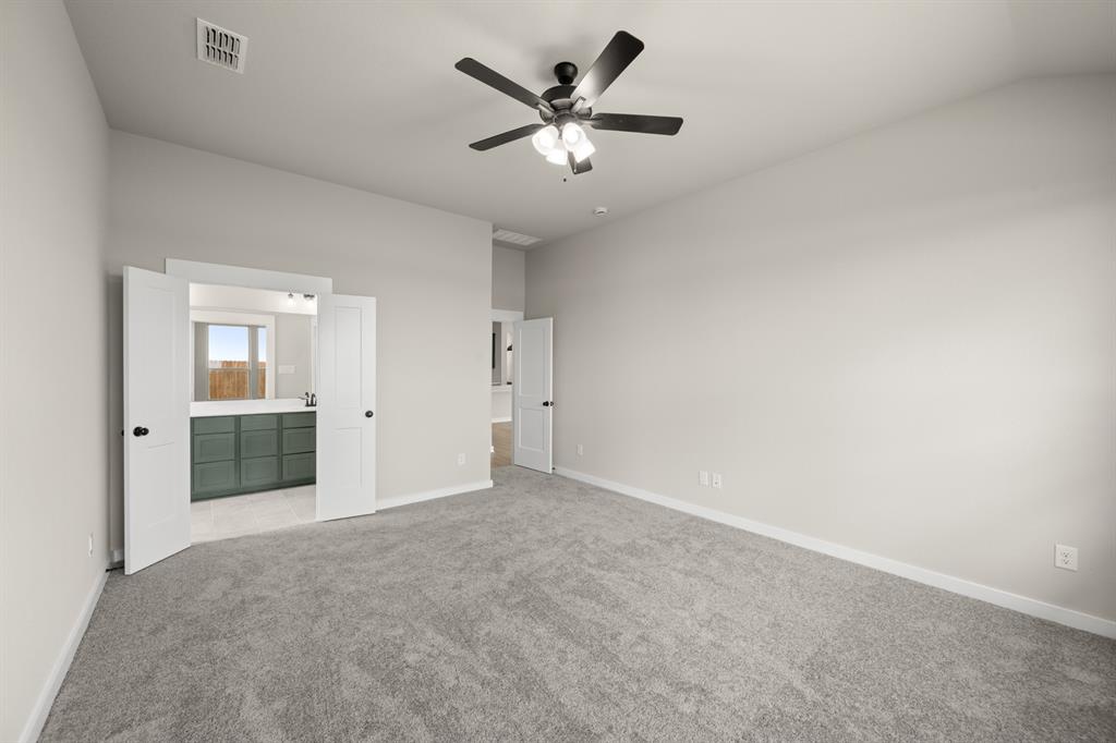 8720 Preakness Street Pilot Point, TX 76258 - Photo 16 of 27 22_6900 Deadwood- Primary Suite-2