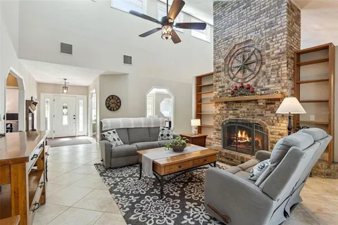 a living room with furniture and a rug