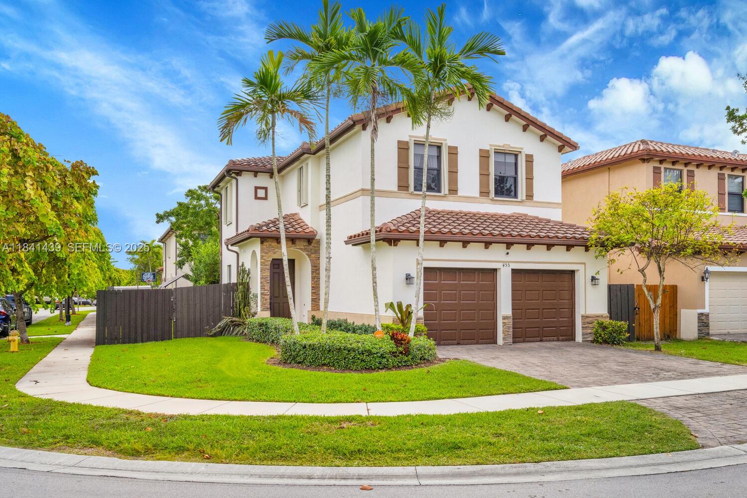 455 Southeast 34th Terrace Homestead, FL 33033 - Photo 1 of 40 Spacious corner 2-story Mediterranean gem with a 2-car garage and a huge fenced backyard!