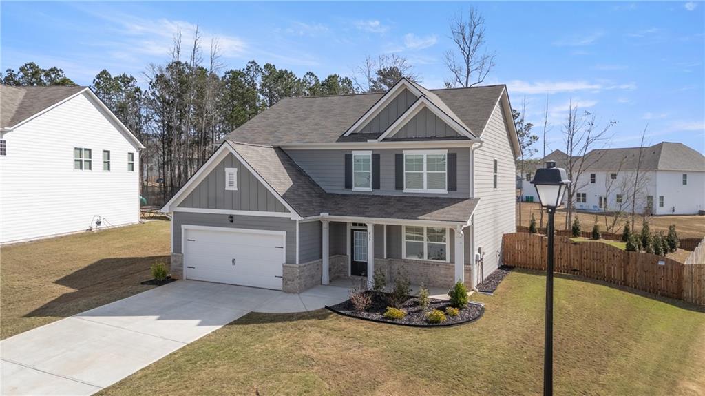 835 Baker View Lane Braselton, GA 30517 - Photo 1 of 1 a front view of a house with a yard