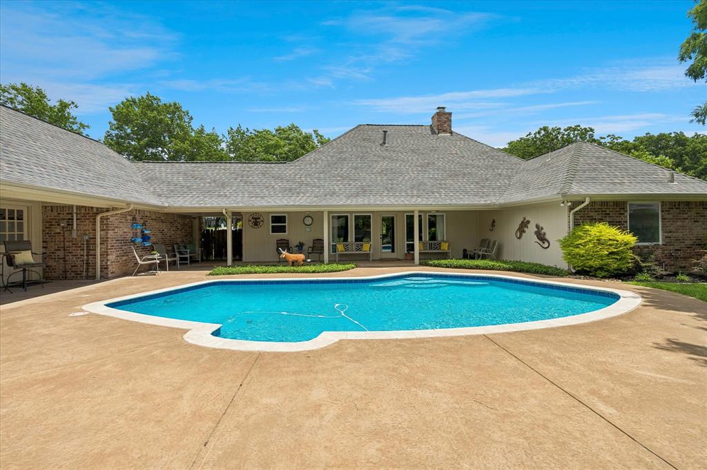 404 Moonlight Lane Keller, TX 76248 - Photo 4 of 40 a view of pool and outdoor seating