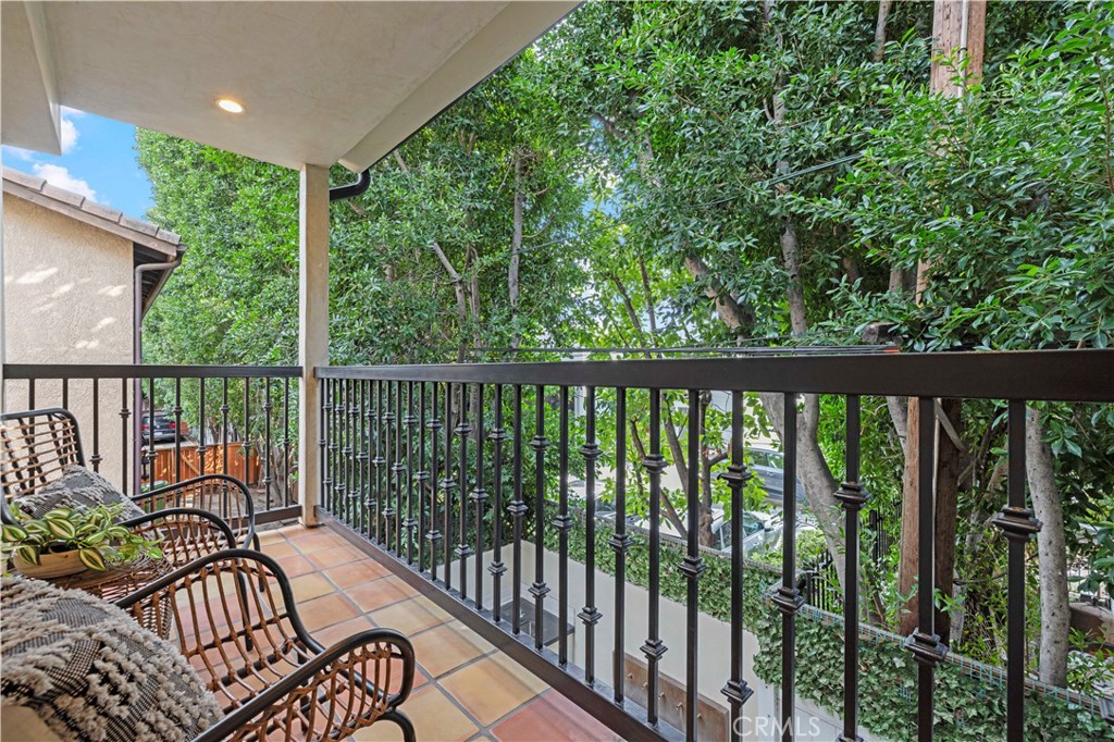 5248 Segals Way Sherman Oaks, CA 91411 - Photo 14 of 37 a view of balcony with wooden floor