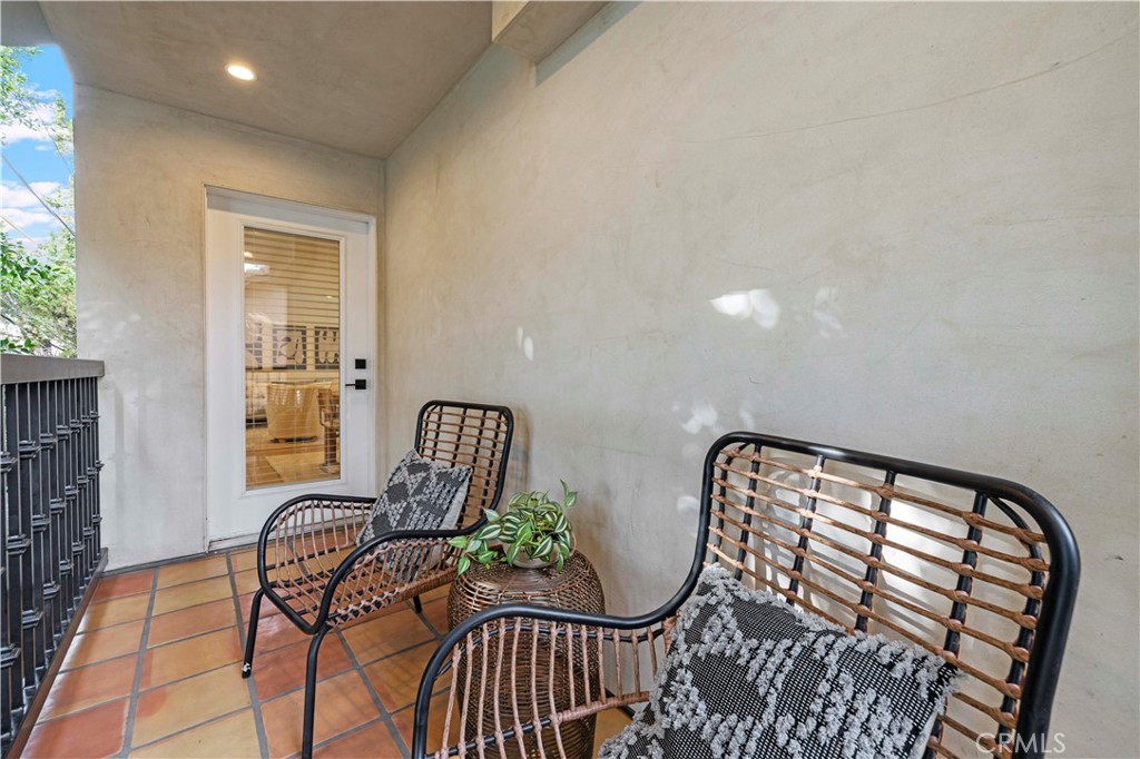 5248 Segals Way Sherman Oaks, CA 91411 - Photo 15 of 37 a view of staircase with furniture and windows