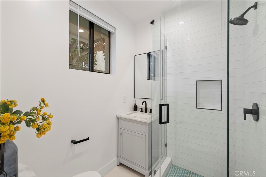 5248 Segals Way Sherman Oaks, CA 91411 - Photo 29 of 37 a bathroom with a shower