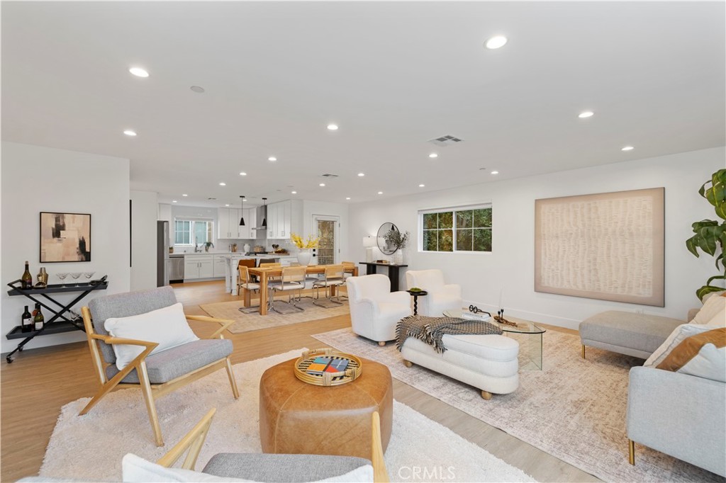 5248 Segals Way Sherman Oaks, CA 91411 - Photo 4 of 37 a living room with furniture and kitchen view
