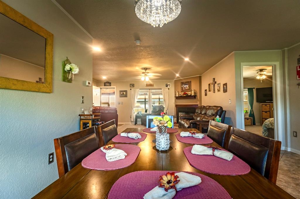 1167 Willow Road Graford, TX 76449 - Photo 12 of 33 a living room with furniture and wooden floor