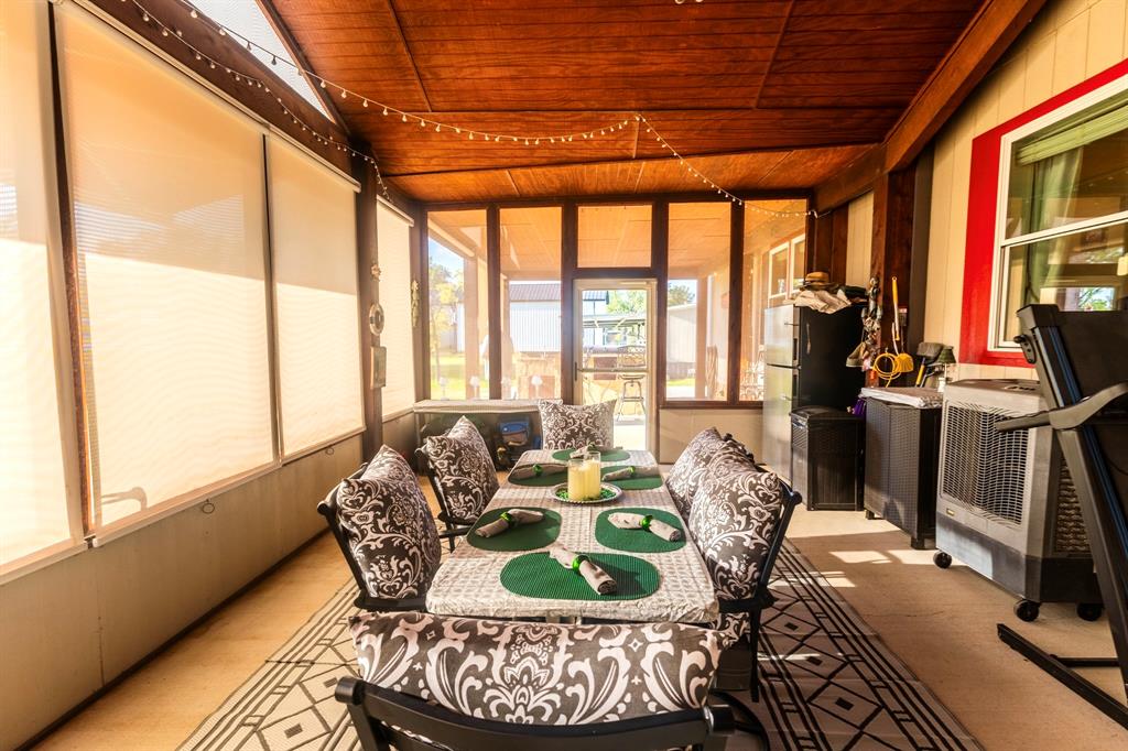 1167 Willow Road Graford, TX 76449 - Photo 7 of 33 a living room with furniture and a large window