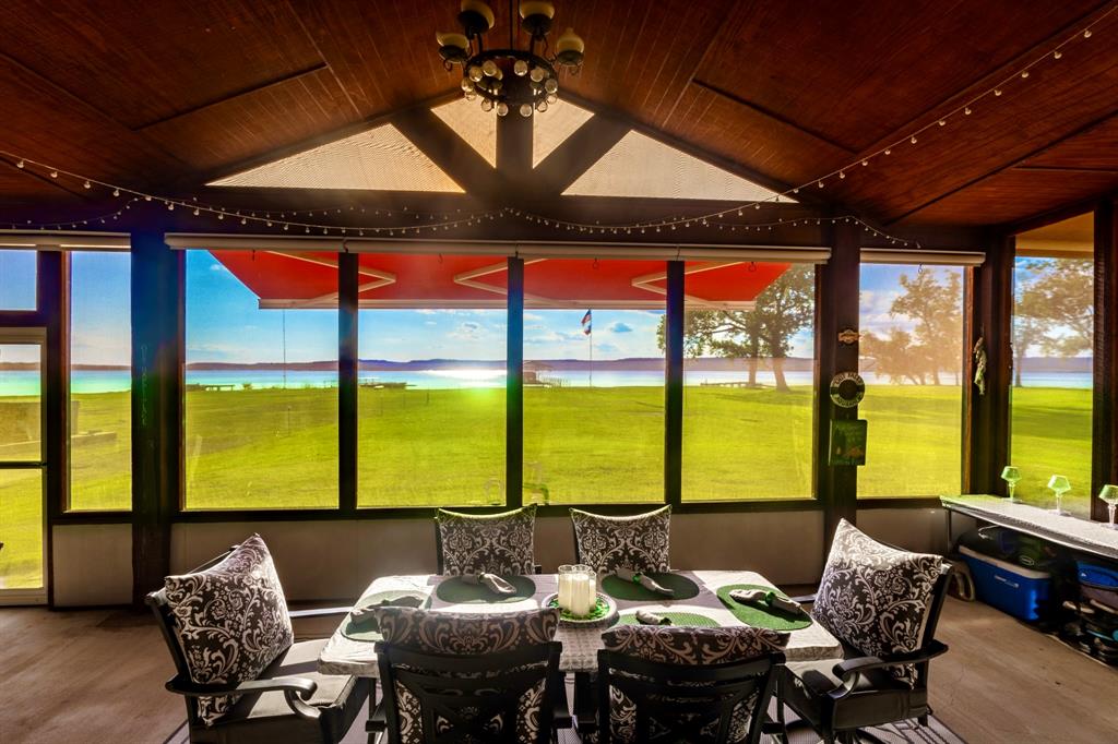 1167 Willow Road Graford, TX 76449 - Photo 8 of 33 a view of a dining room with furniture and window