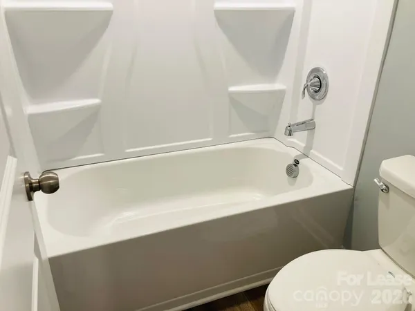 a bathroom with a sink and toilet
