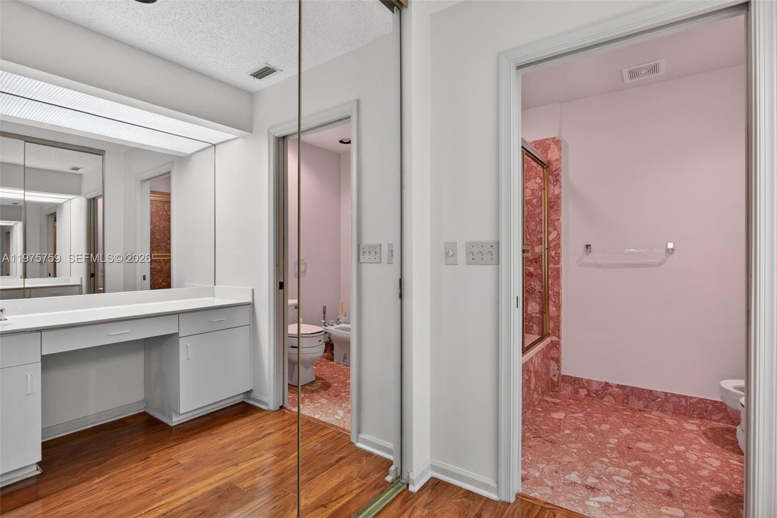 6708 North Pine Island Road Tamarac, FL 33321 - Photo 24 of 40 a view of a bathroom with a shower and a sink