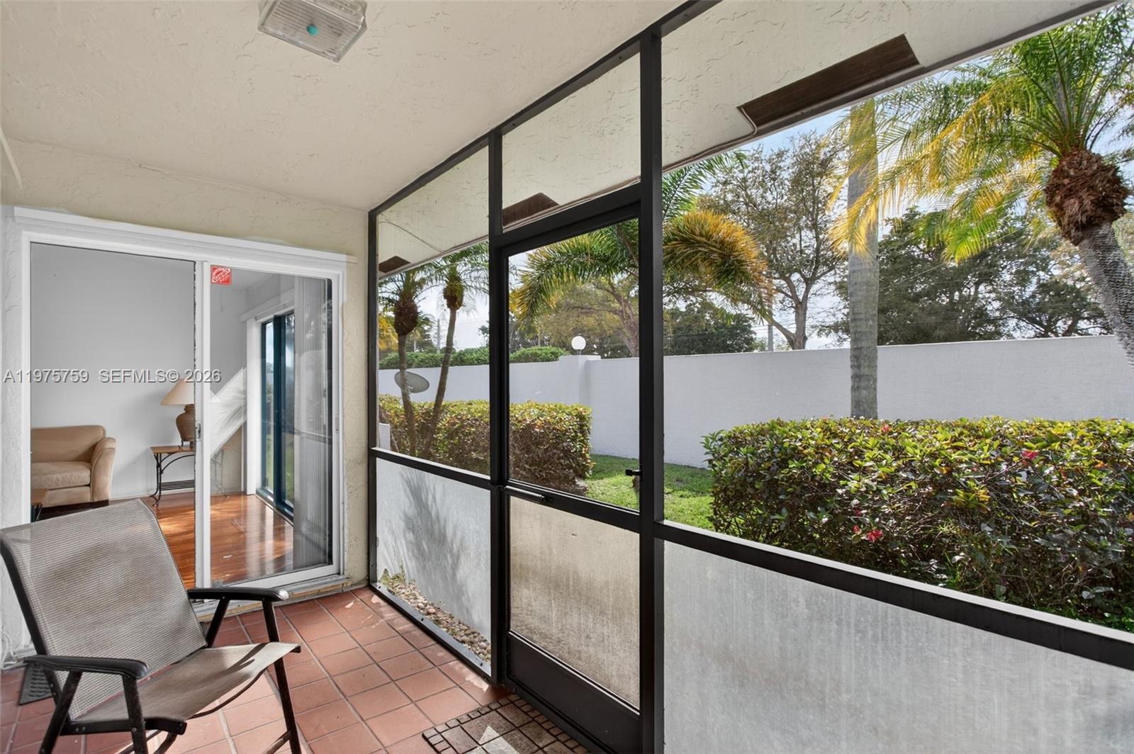 6708 North Pine Island Road Tamarac, FL 33321 - Photo 28 of 40 a view of a porch