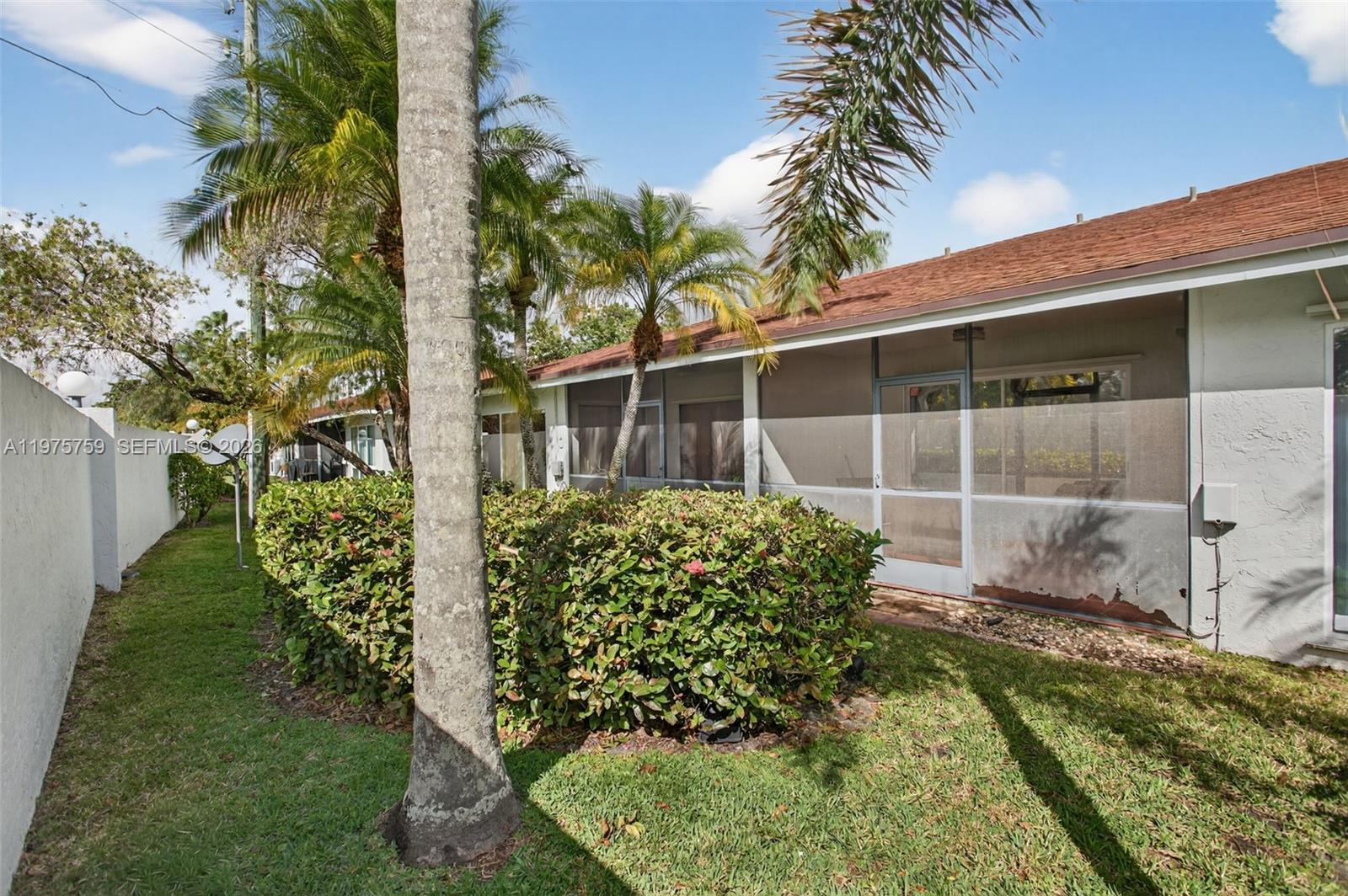 6708 North Pine Island Road Tamarac, FL 33321 - Photo 30 of 40 a view of a backyard