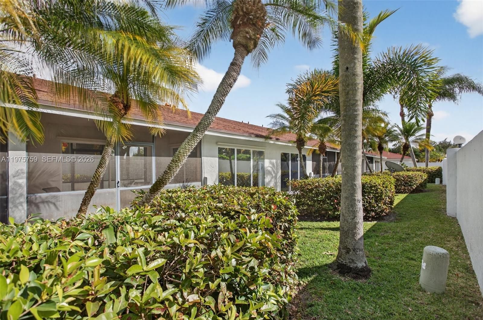 6708 North Pine Island Road Tamarac, FL 33321 - Photo 31 of 40 a view of a garden with a plants