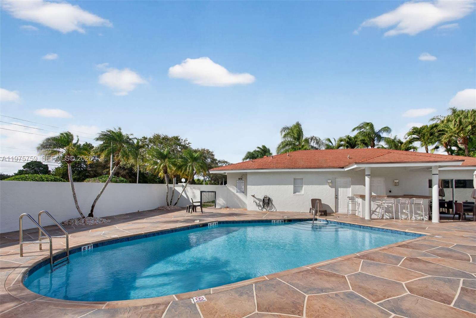 6708 North Pine Island Road Tamarac, FL 33321 - Photo 33 of 40 a view of a house with swimming pool