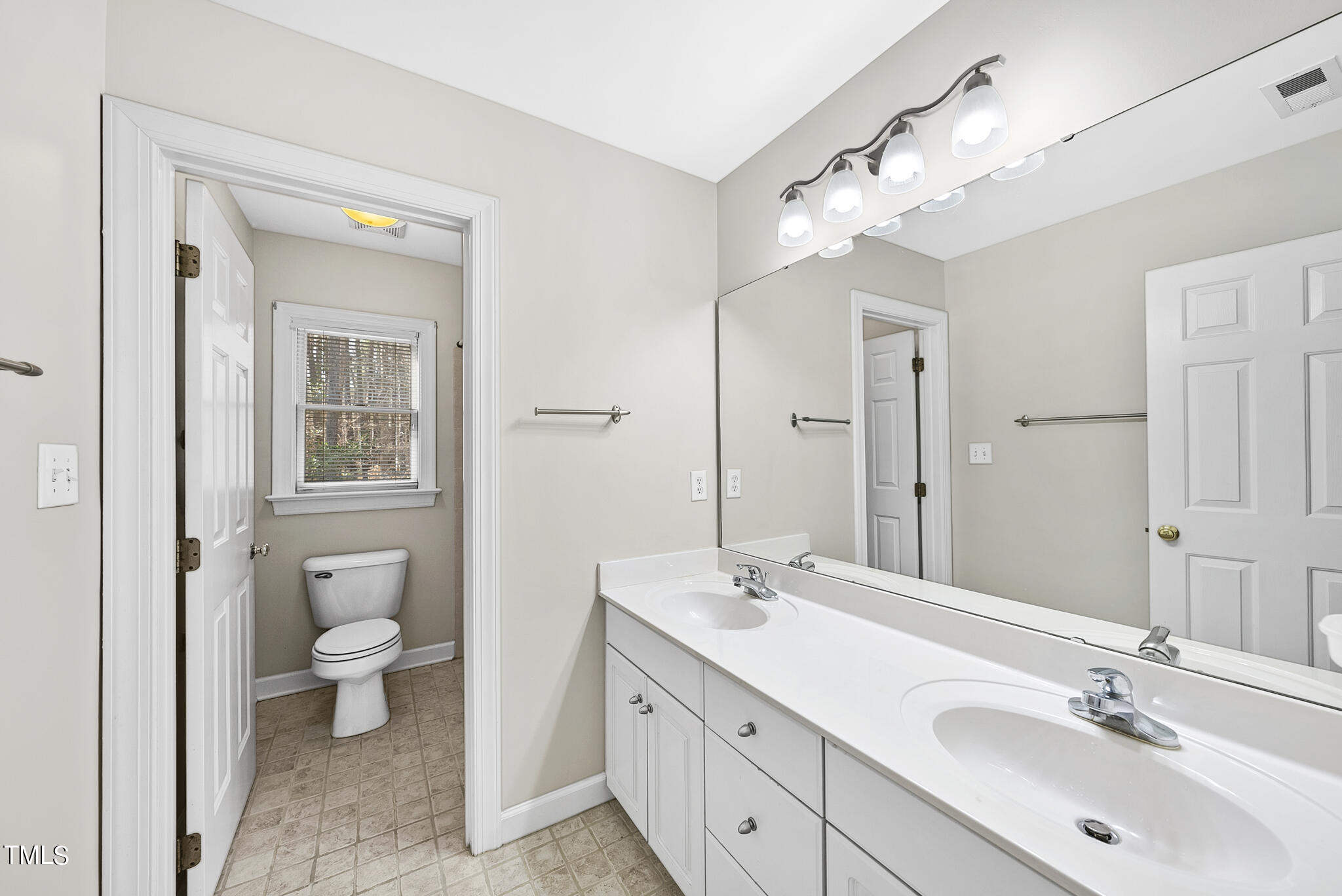 2309 Sunnystone Way Raleigh, NC 27613 - Photo 31 of 45 Shared Bathroom