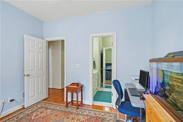 a workspace with furniture and bedroom
