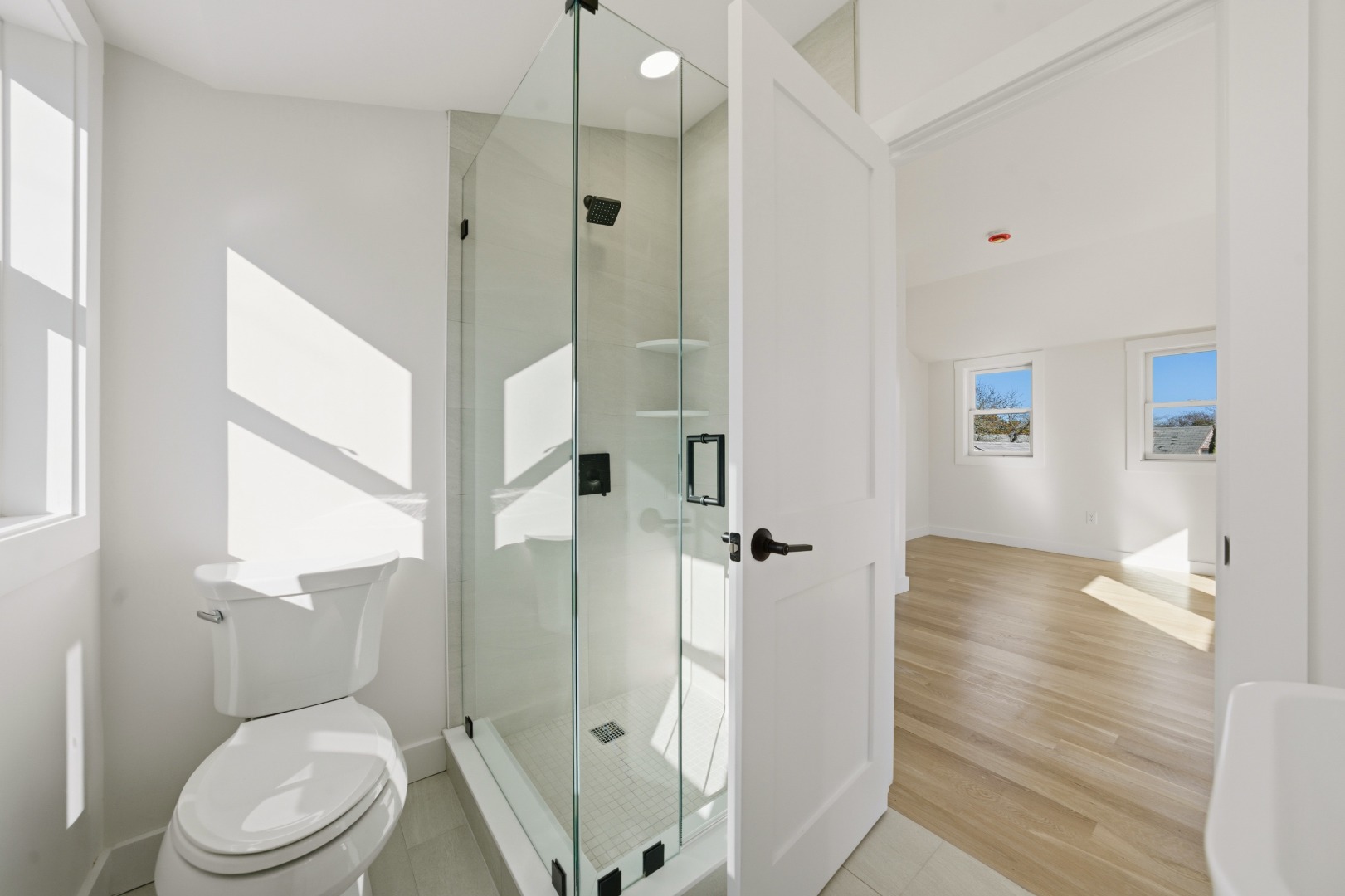 38 Hooper Farm Road Nantucket, MA 02554 - Photo 16 of 19 a bathroom with a toilet a sink and shower