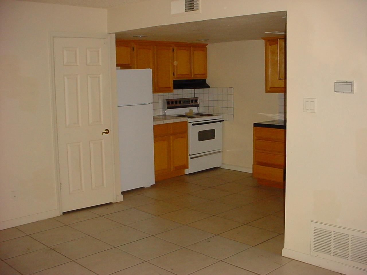 4051 West Wonderview Road Phoenix, AZ 85019 - Photo 3 of 8 Kitchen with lots of cabinets
