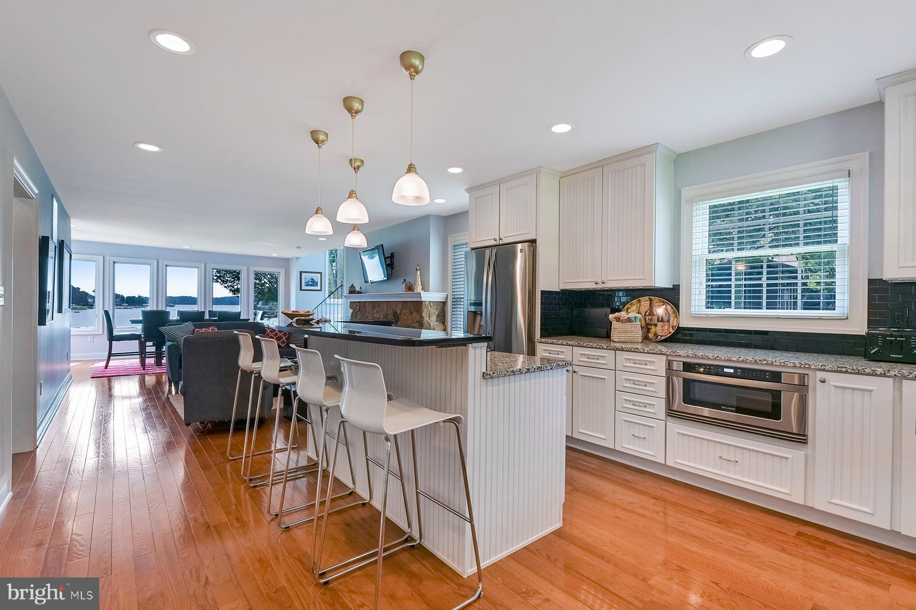 377 Edgewater Road Pasadena, MD 21122 - Photo 6 of 78 Kitchen with center island with a breakfast bar